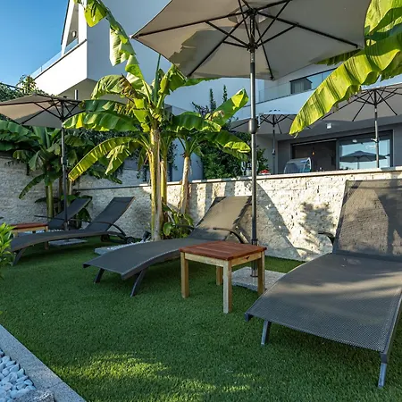 Luxury White Sails With A Multi Sport Court And Sea View