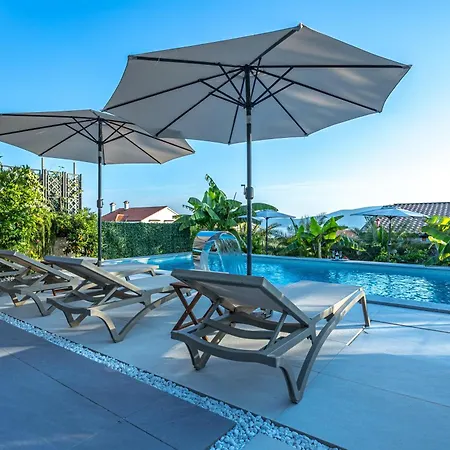 Luxury White Sails With A Multi Sport Court And Sea View