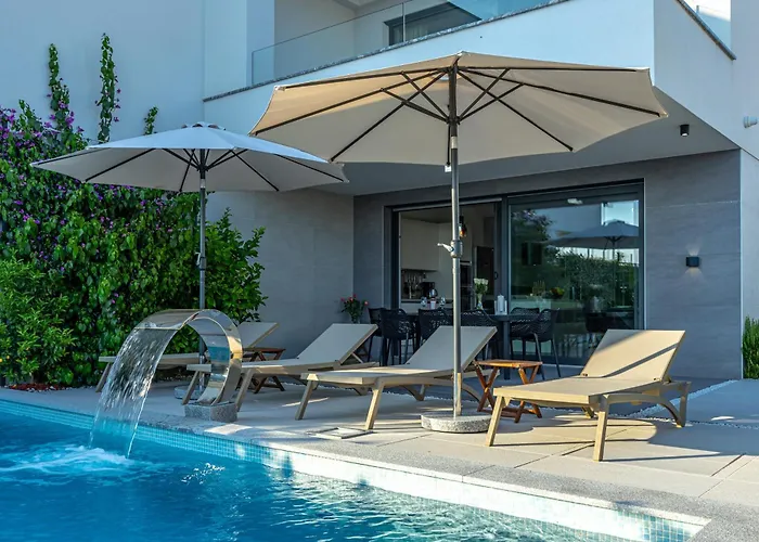 Luxury White Sails With A Multi Sport Court And Sea View