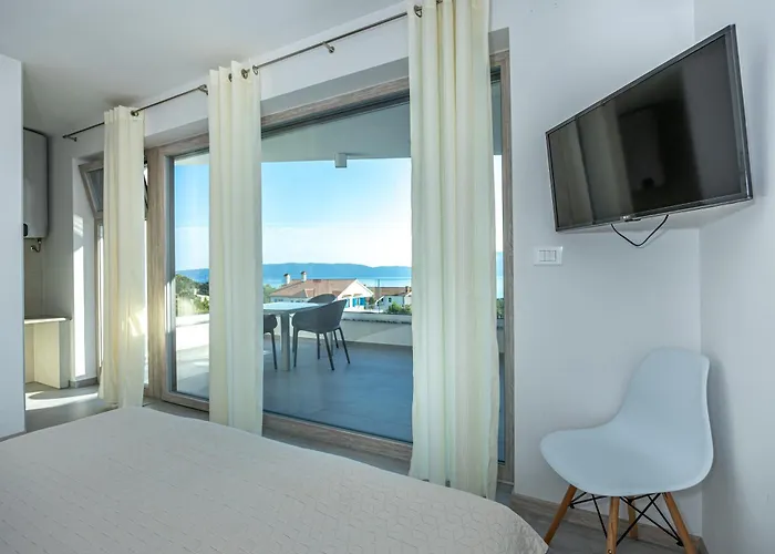 Luxury White Sails With A Multi Sport Court And Sea View
