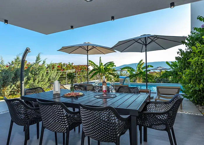 Luxury White Sails With A Multi Sport Court And Sea View