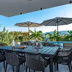 Luxury White Sails With A Multi Sport Court And Sea View